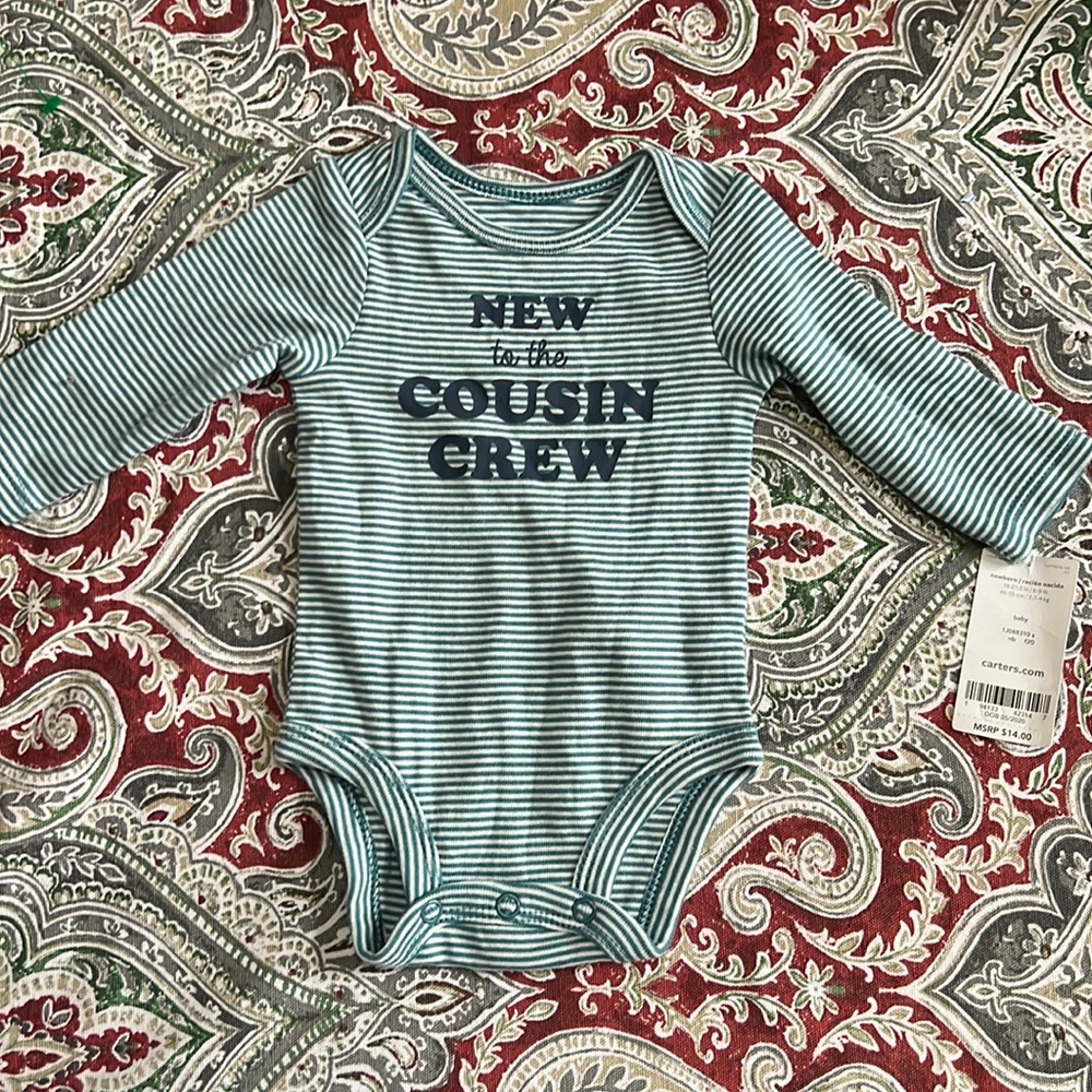 Carters newborn “Cousin” onesie
